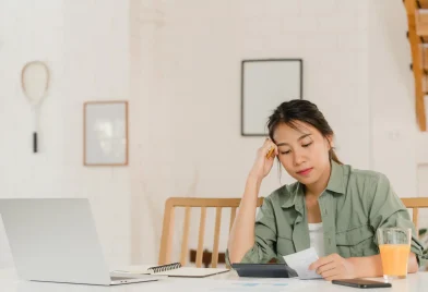 business-asian-women-records-income-expenses-home