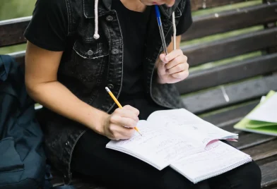crop-pensive-man-studying-bench_11zon
