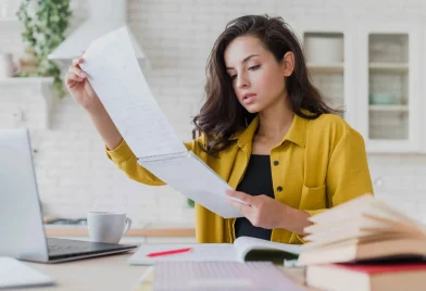 medium-shot-girl-checking-her-notes_11zon