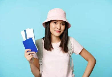smiling-korean-girl-tourist-showing-passport-tickets-flight-booking-hotel-going-trip-voya_11zon