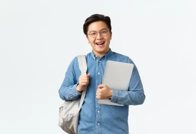university-study-abroad-lifestyle-concept-smiling-cheerful-asian-guy-glasses-standing-with-backpack-laptop-student-his-way-classes-posing-white-background